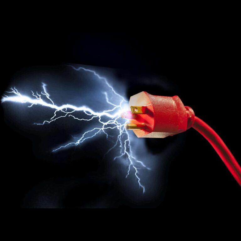 Preventing power surges, Electrical plug with sparks.