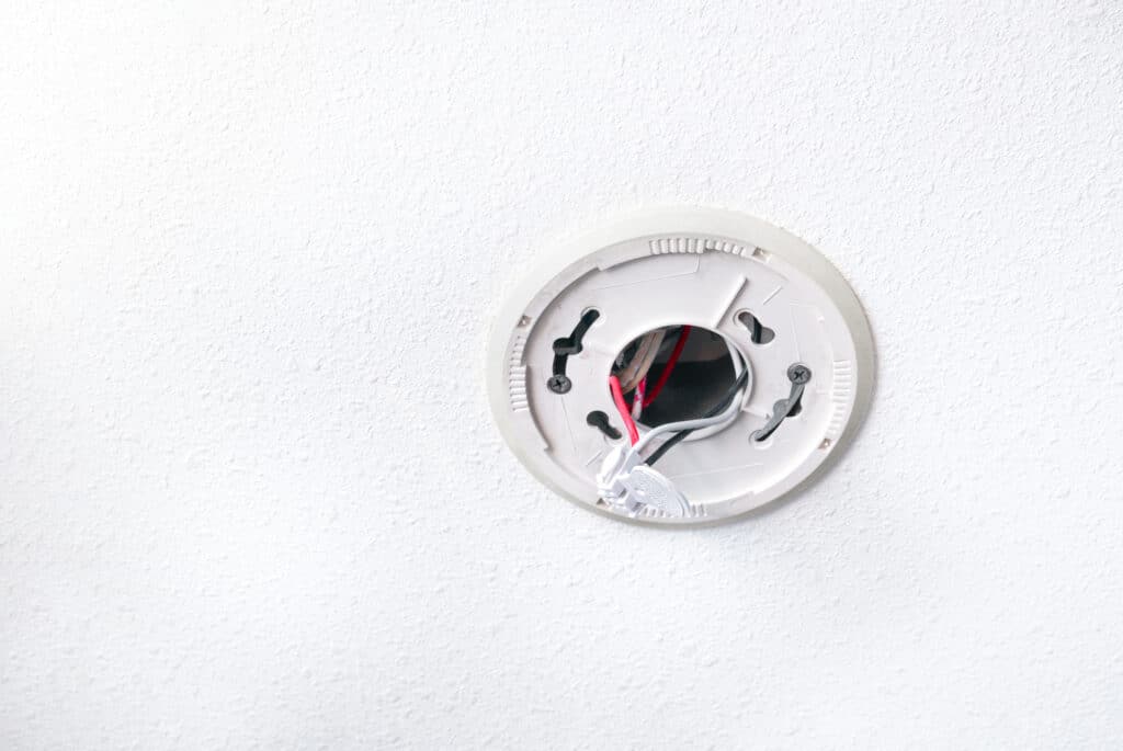Hardwired smoke alarms.